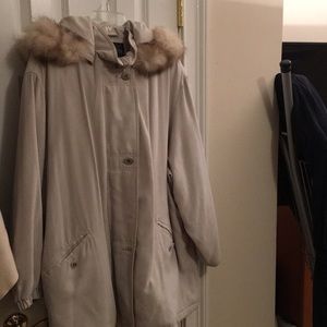 Women’s mid length winter coat with removable fur lined hood